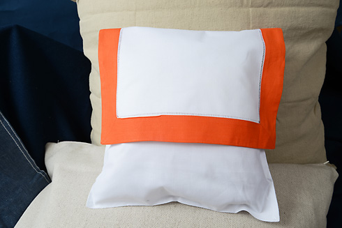 Hemstitch Baby Envelope Pillows. 12"x12". Orange color border